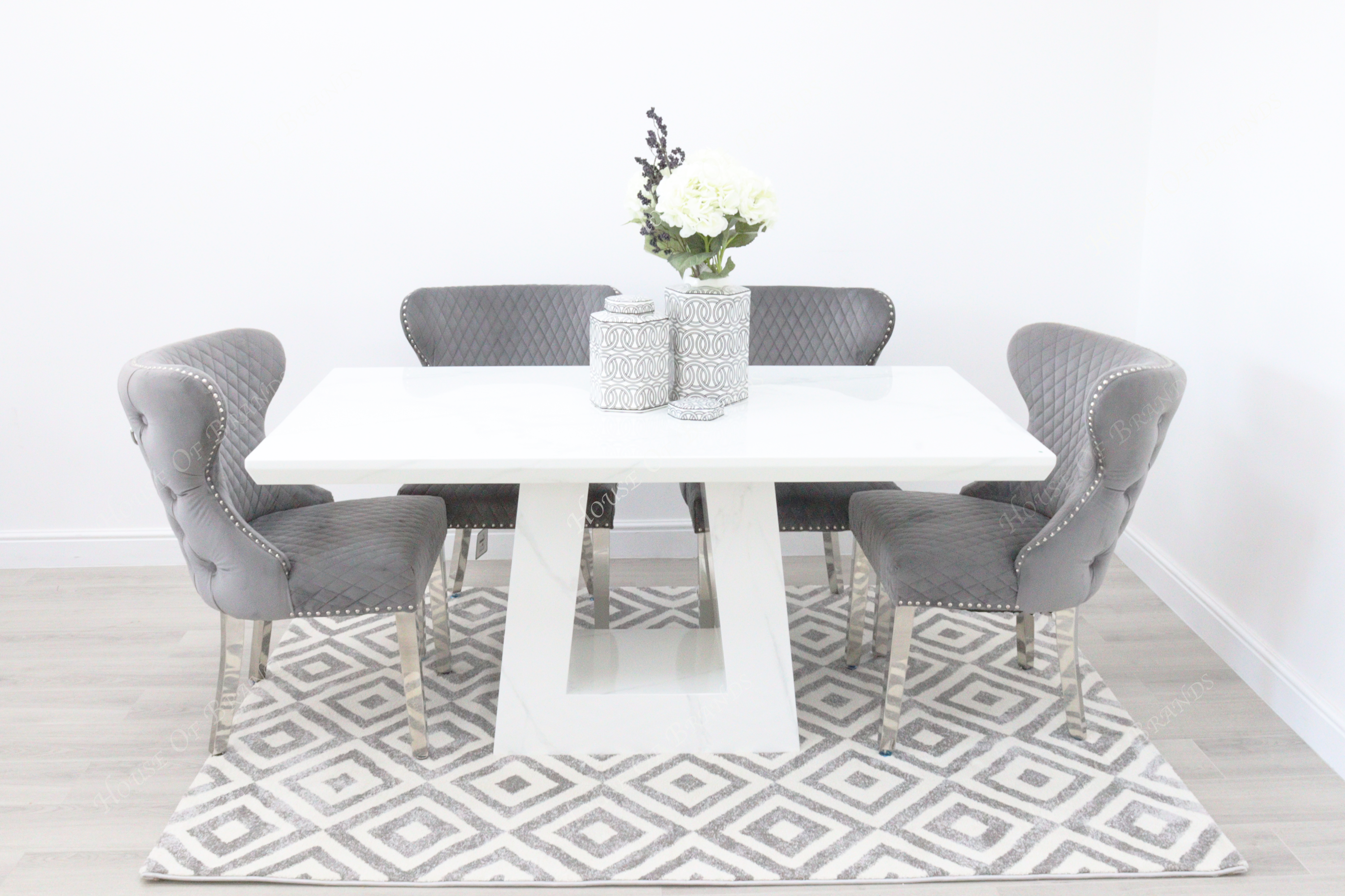 Milan White Marble Dining Table with 4 Valentino Velvet Knockerback Dining Chairs