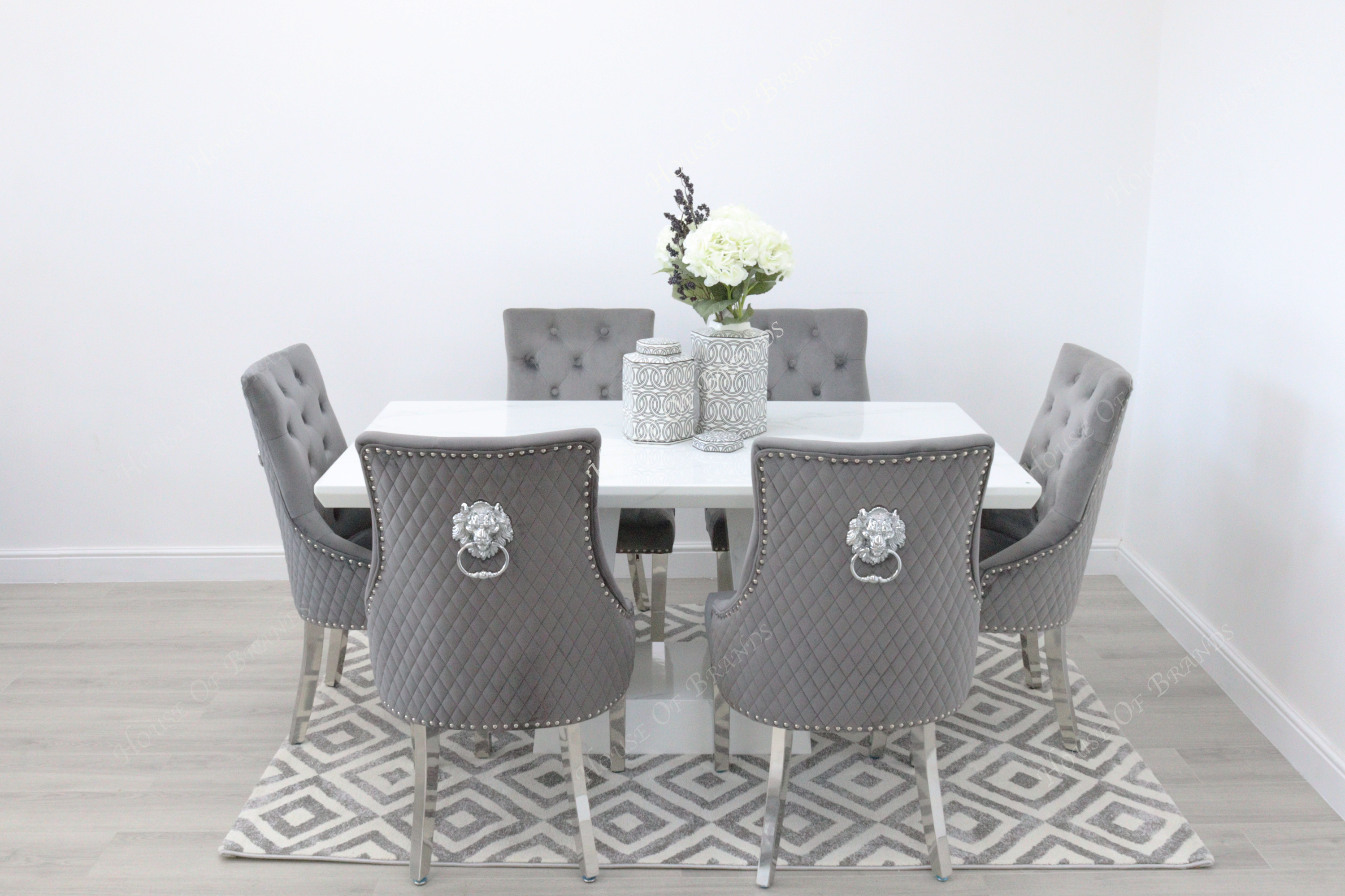 Milan White Marble Dining Table with 6 Majestic Knockerback Velvet Dining Chairs