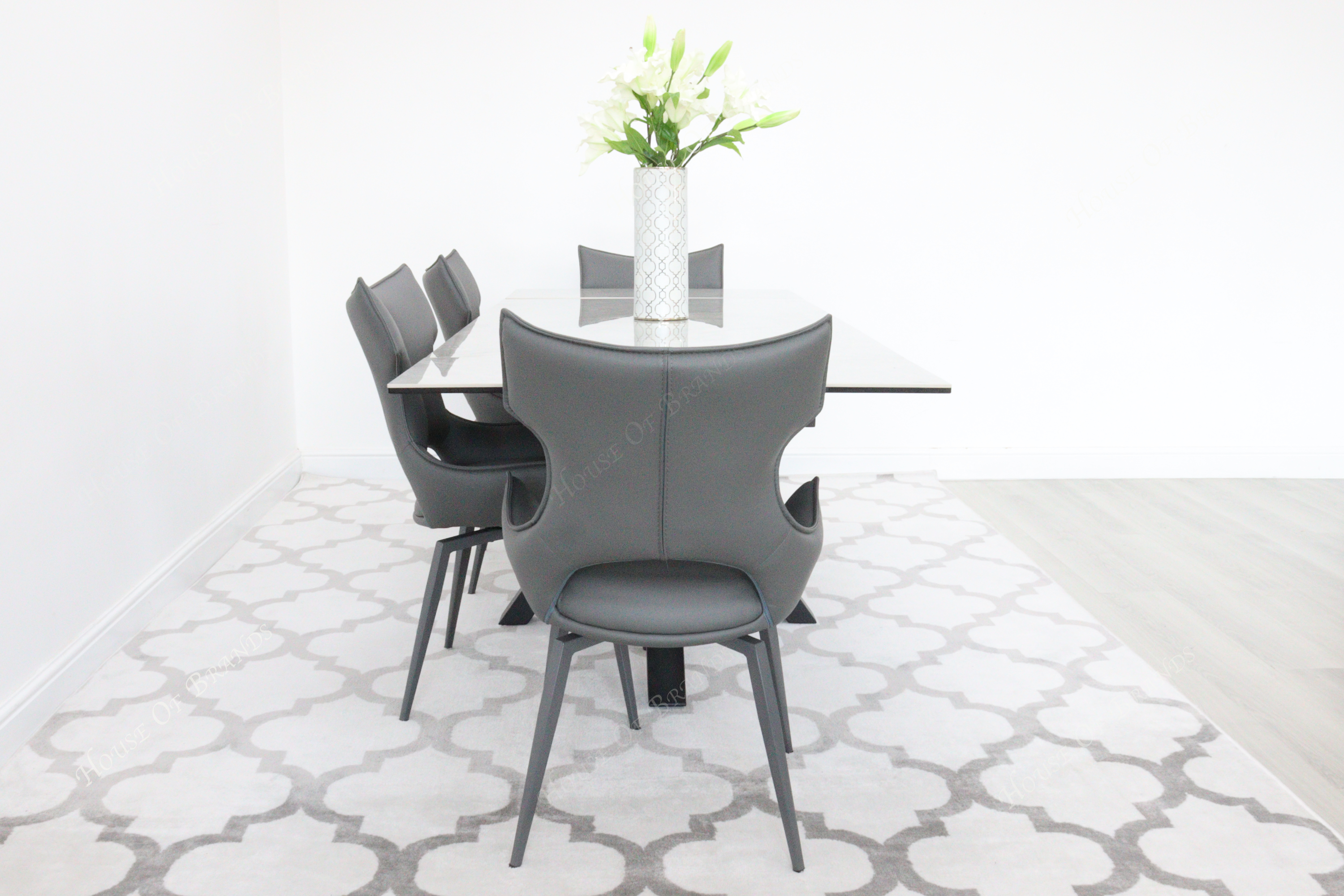 Phoenix Extendable Ceramic Dining Table and 4 Grey Rafaello Swivel Dining Chairs