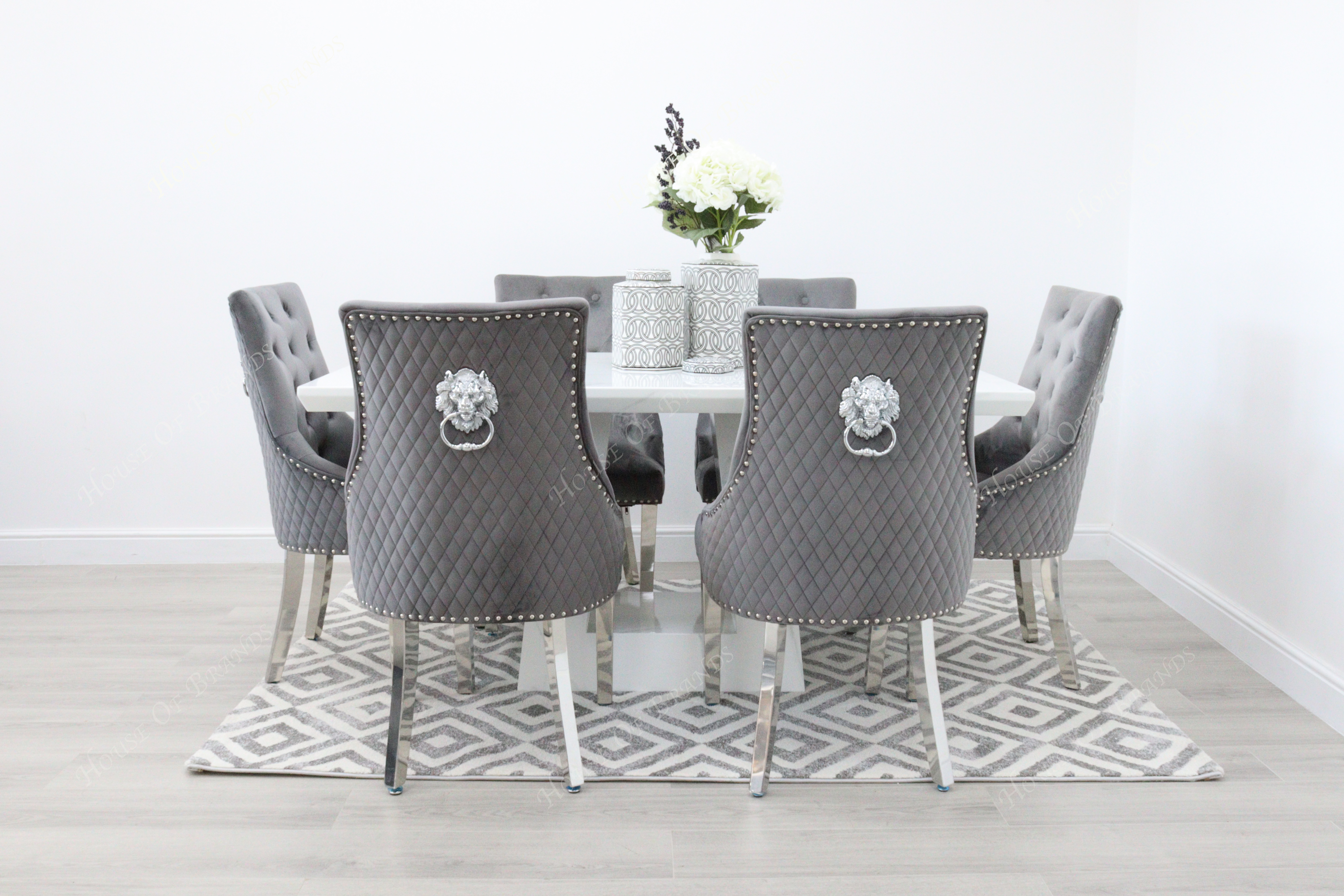 Milan White Marble Dining Table with 6 Majestic Knockerback Velvet Dining Chairs