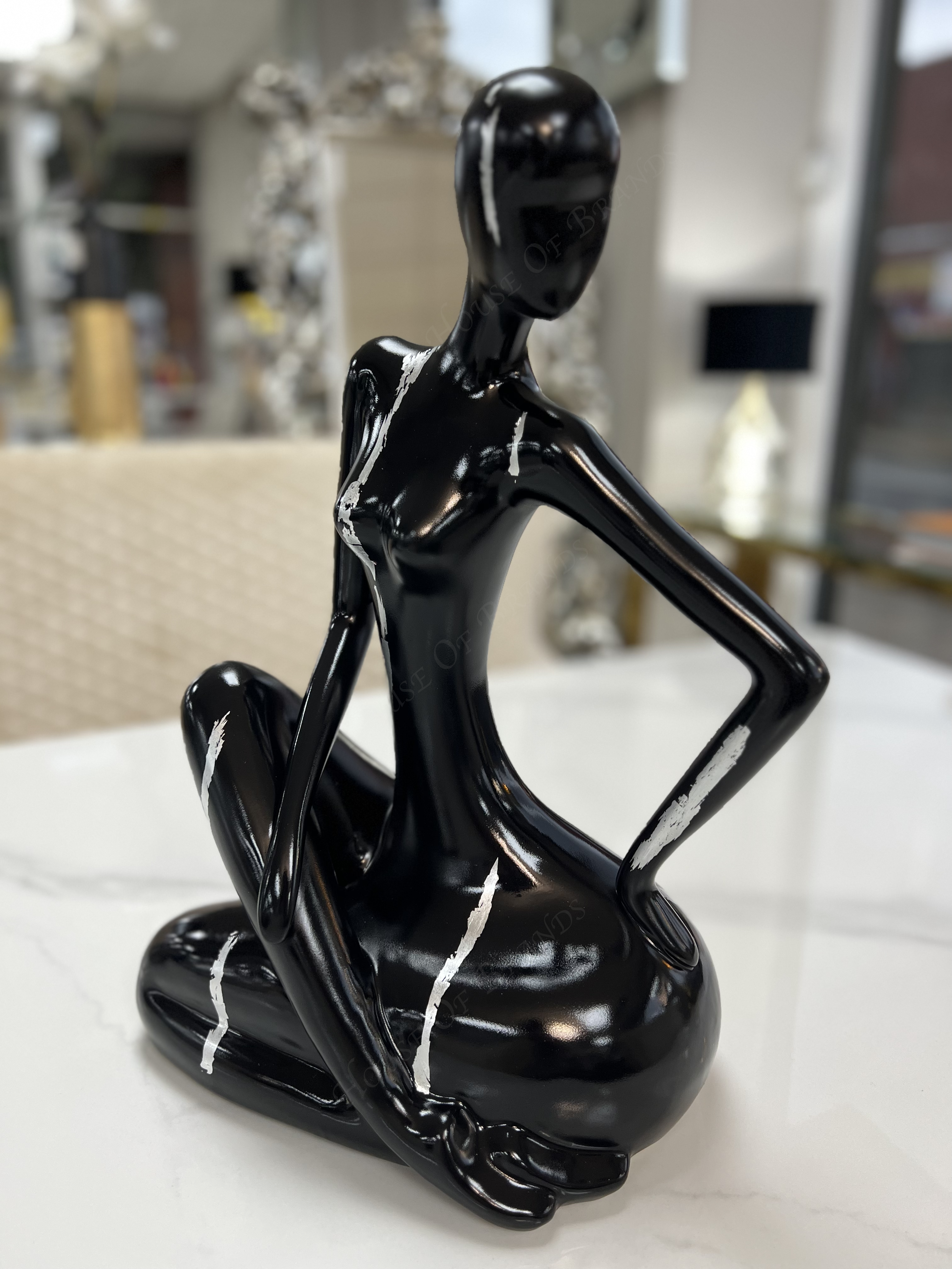 Bespoke Black and Silver Ceramic Sitting Lady