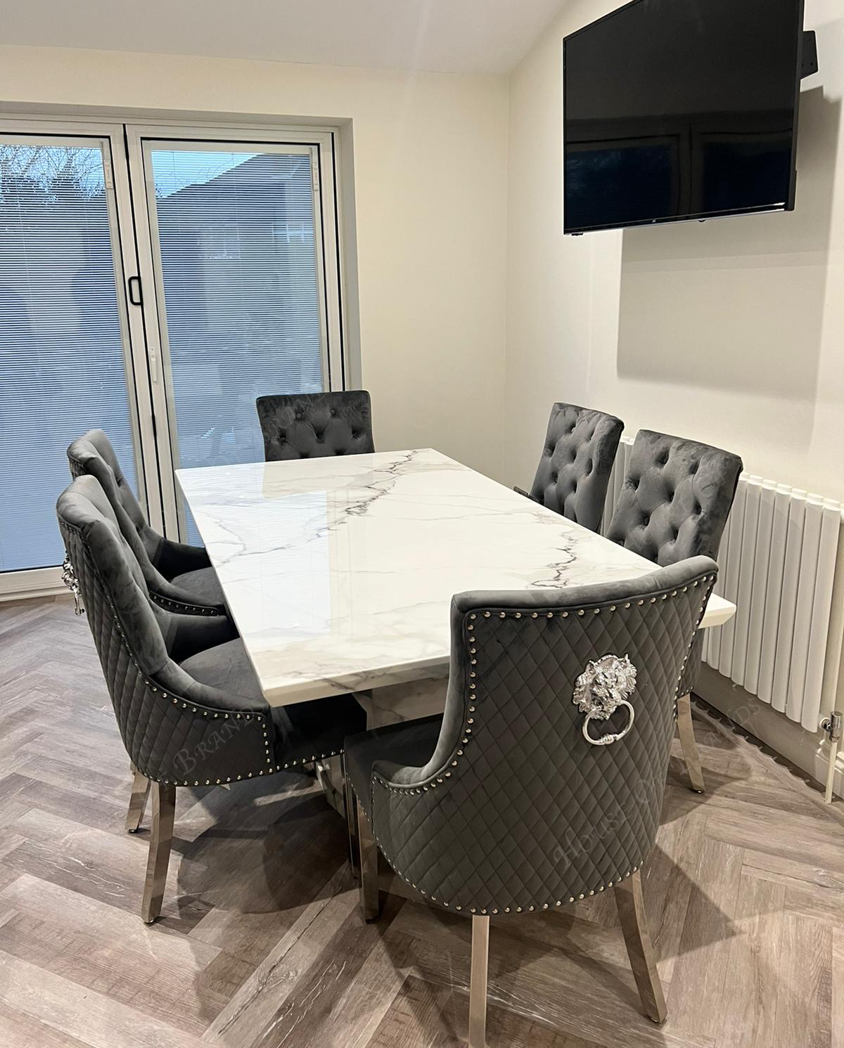 Naples White Marble Dining Table with Majestic Velvet Knockerback Dining Chairs