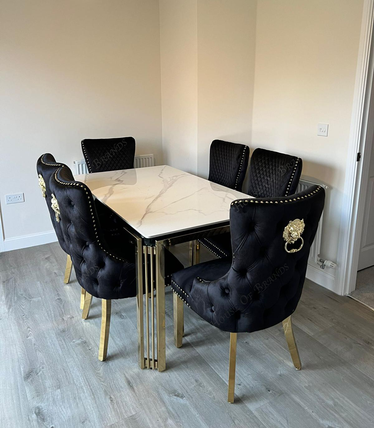 150cm Sorrento Rectangle Gold Ceramic Dining Table & Black and Gold Victoria Knockerback Dining Chairs