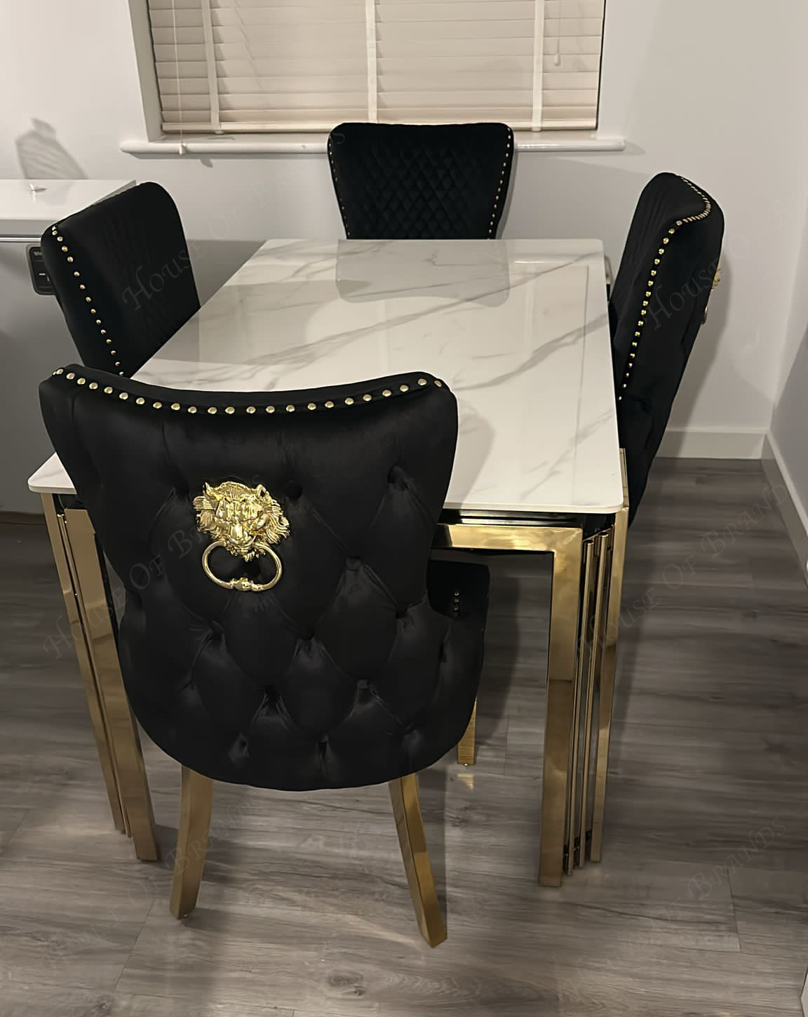 150cm Sorrento Rectangle Gold Ceramic Dining Table & Black and Gold Victoria Knockerback Dining Chairs