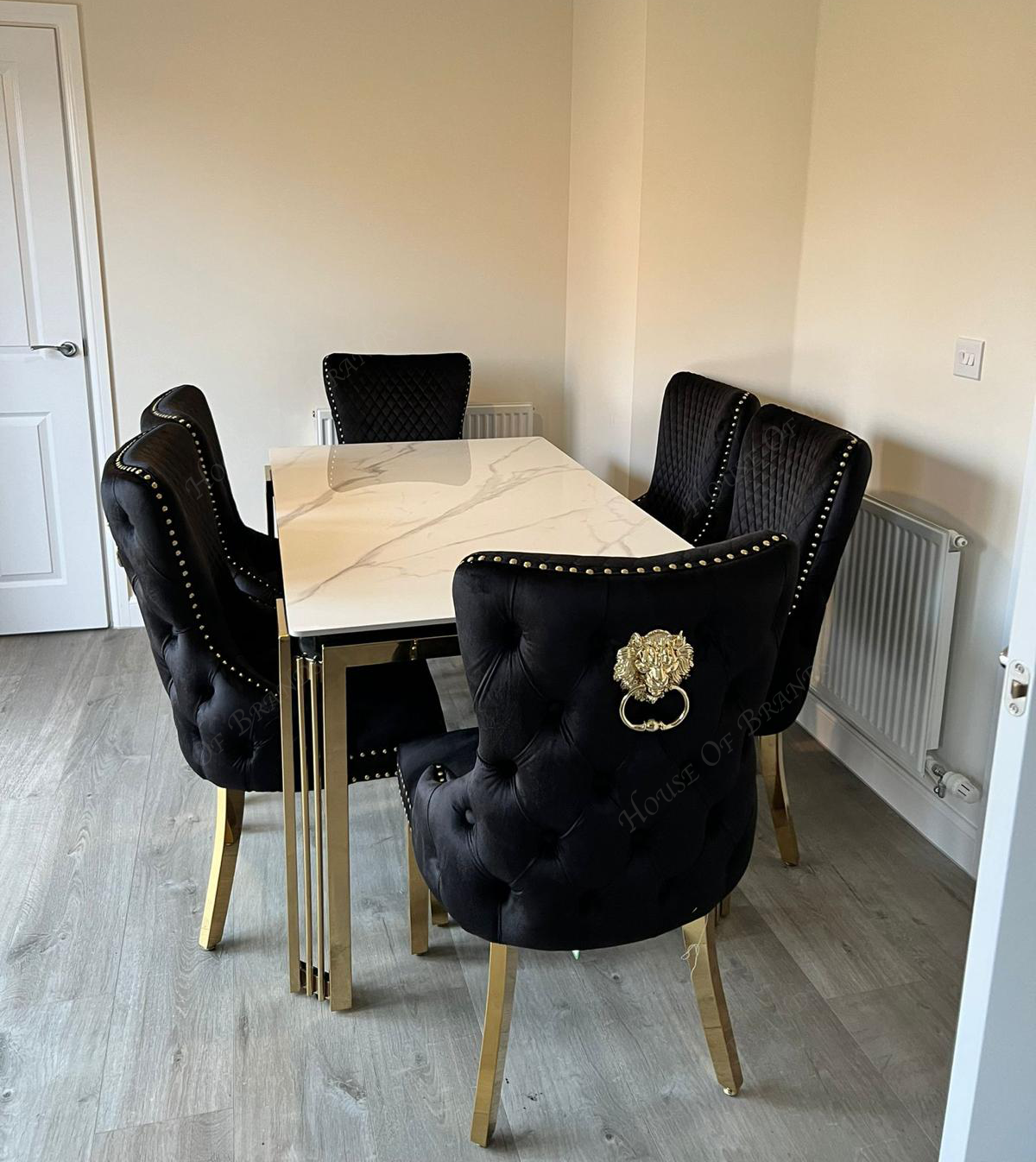 150cm Sorrento Rectangle Gold Ceramic Dining Table & Black and Gold Victoria Knockerback Dining Chairs