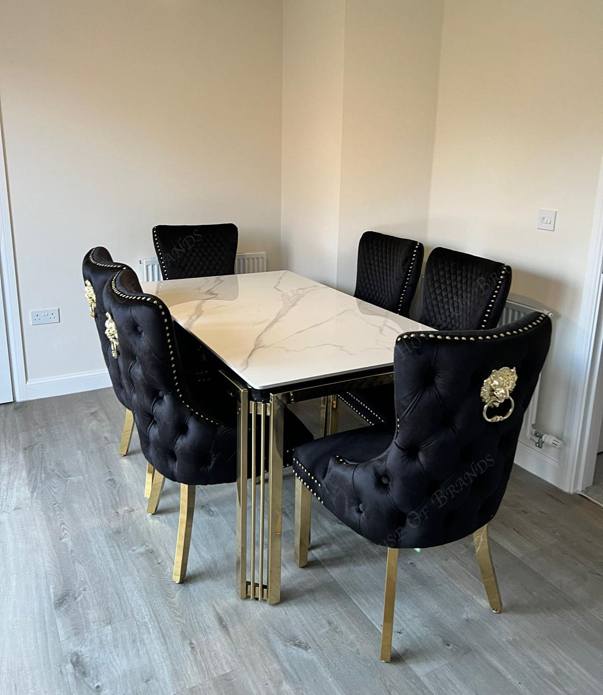 150cm Sorrento Rectangle Gold Ceramic Dining Table & Black and Gold Victoria Knockerback Dining Chairs