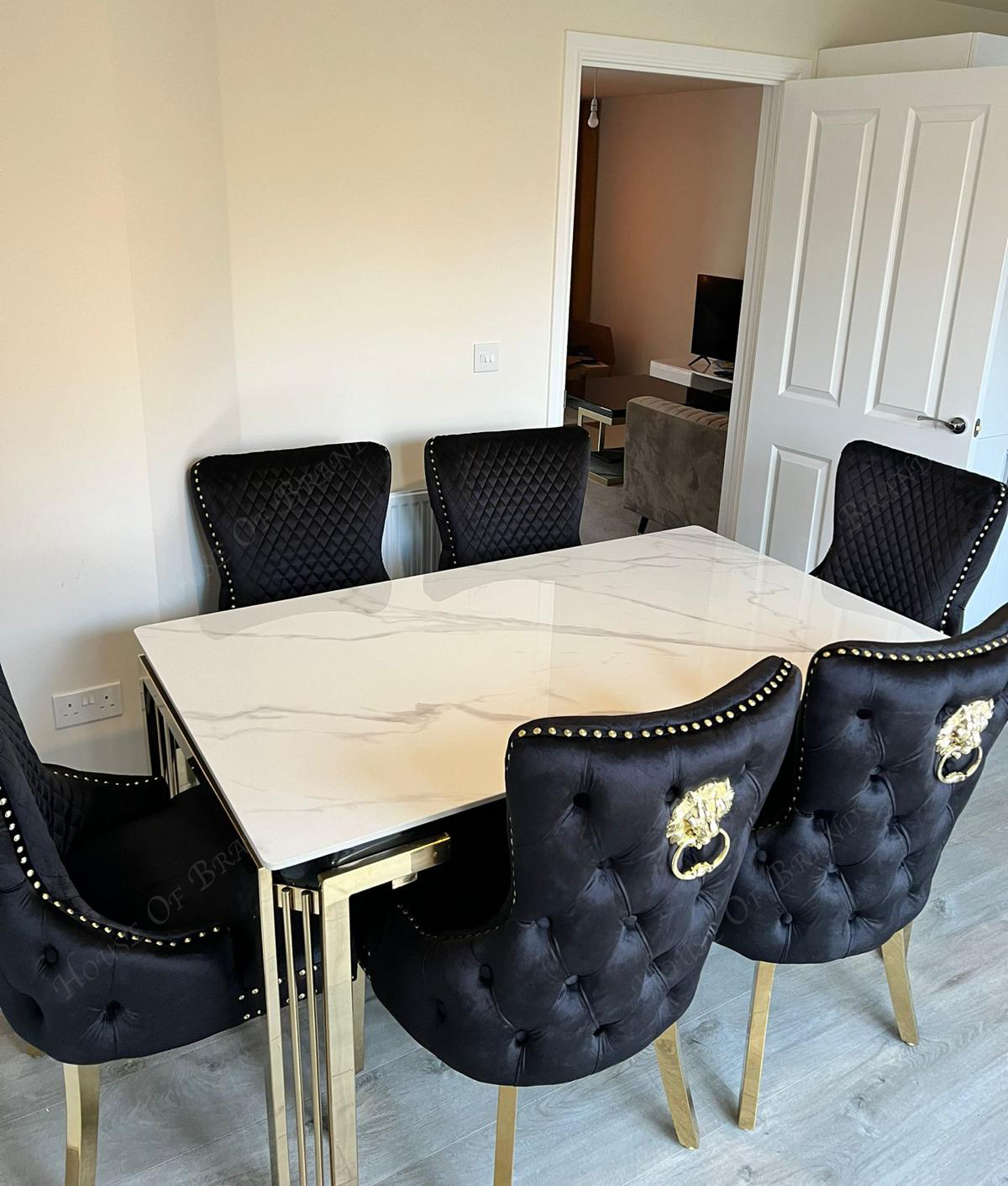 150cm Sorrento Rectangle Gold Ceramic Dining Table & Black and Gold Victoria Knockerback Dining Chairs