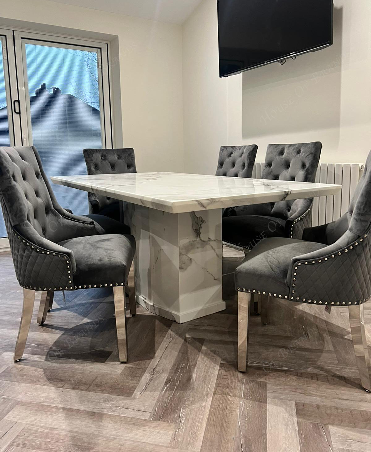 Naples White Marble Dining Table with Majestic Velvet Knockerback Dining Chairs