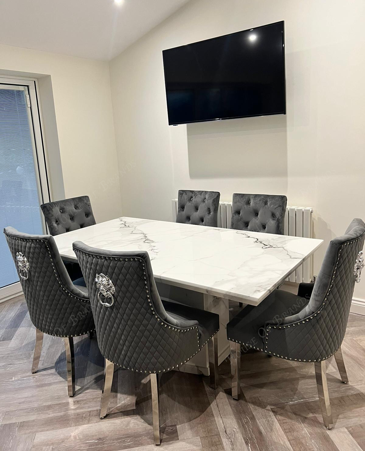 Naples White Marble Dining Table with Majestic Velvet Knockerback Dining Chairs